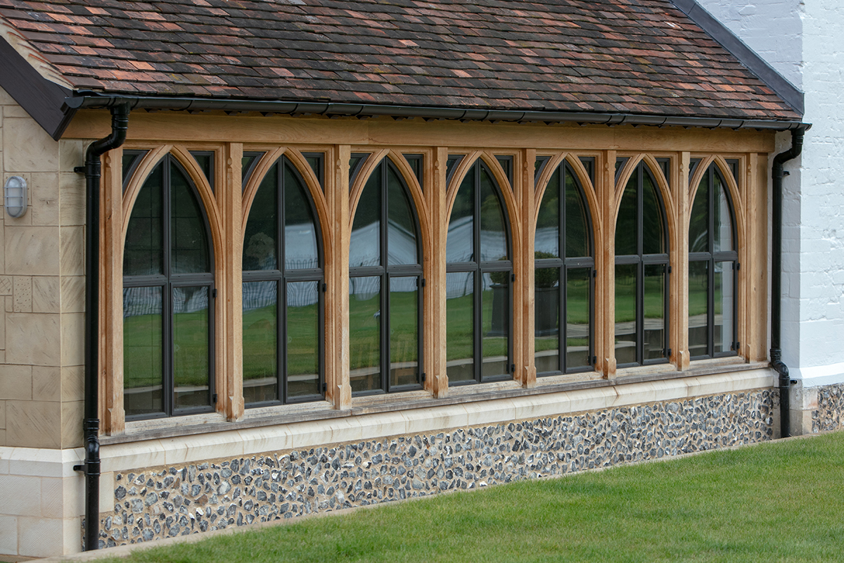 Screen of bronze windows