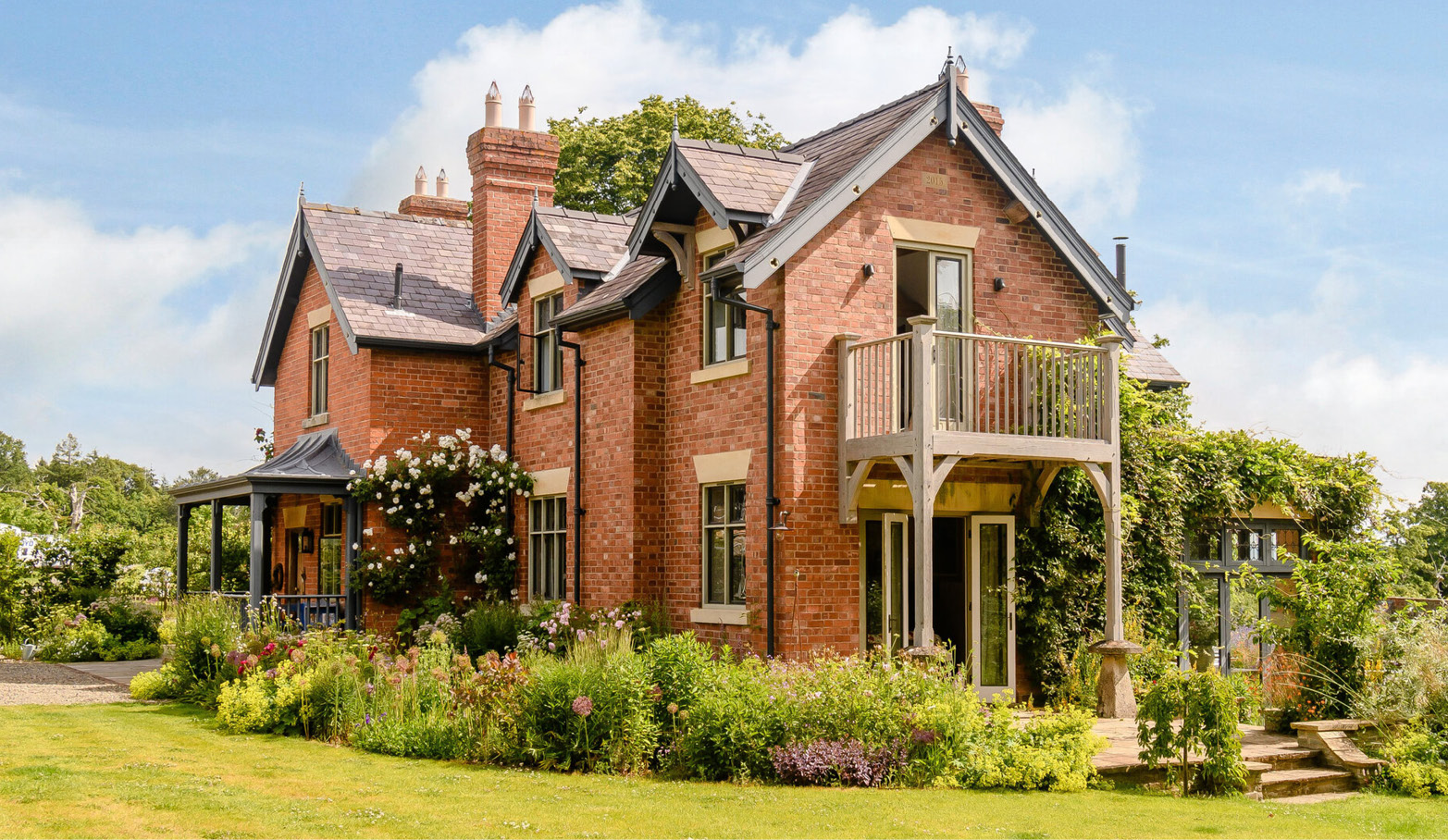 victorian farmhouse with bronze windows