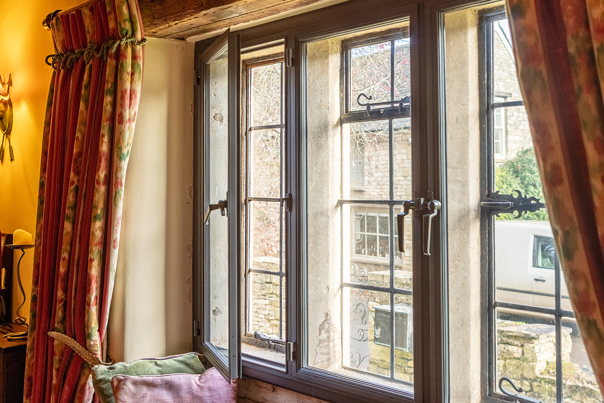 Secondary glazing within a city property